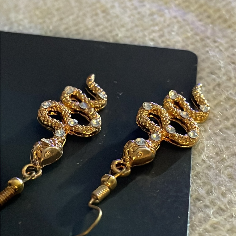 Stone encrusted snake earrings